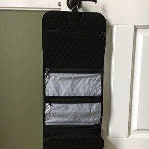 Classic Vera Bradley hanging toiletry organizer.